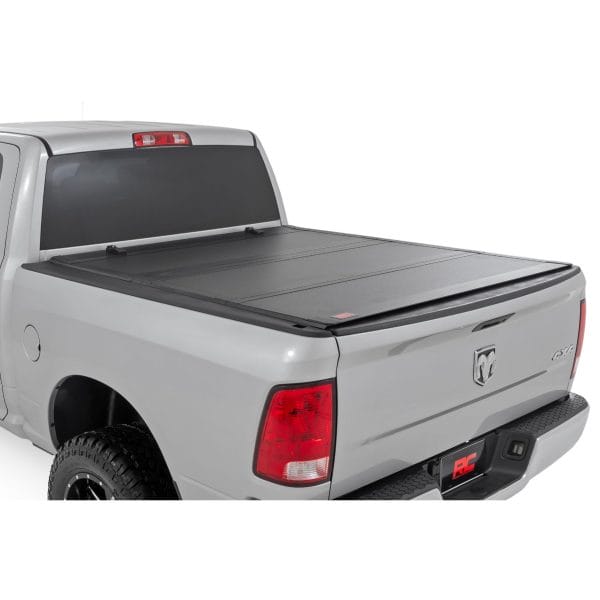 Hard Tri-Fold Flip Up Bed Cover - 5'7" Bed - Ram 1500 (09-18)