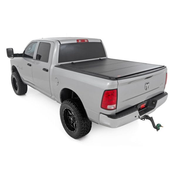 Hard Tri-Fold Flip Up Bed Cover - 5'7" Bed - Ram 1500 (09-18)